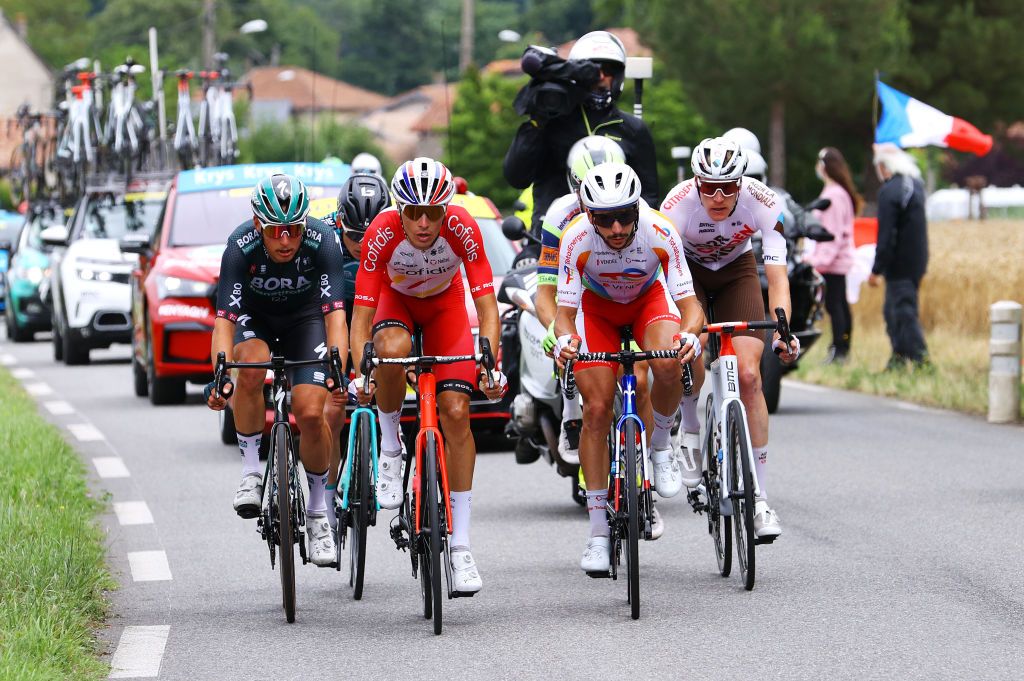 SAINTLARYSOULAN COL DU PORTET FRANCE JULY 14 Lukas Pstlberger of Austria and Team BORA Hansgrohe Anthony Perez of France and Team Cofidis Anthony Turgis of France and Team TotalEnergies Dorian Godon of France and AG2R Citron Team in the Breakaway during the 108th Tour de France 2021 Stage 17 a 1784km stage from Muret to SaintLarySoulan Col du Portet 2215m LeTour TDF2021 on July 14 2021 in SaintLarySoulan Col du Portet France Photo by Tim de WaeleGetty Images