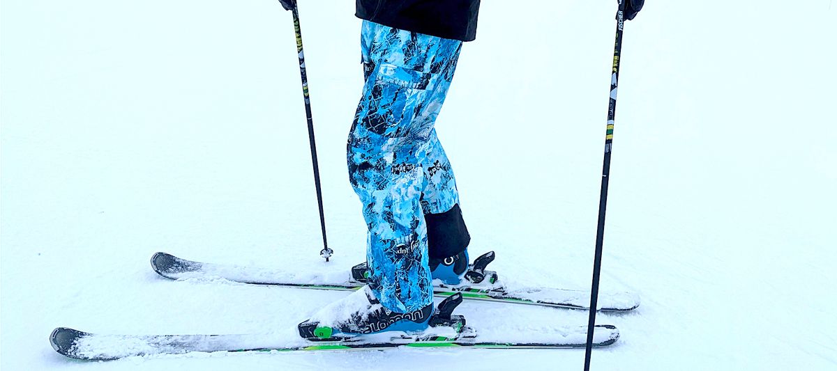 Man wearing The North Face Dragline Bib Trousers (Cole Navin design)