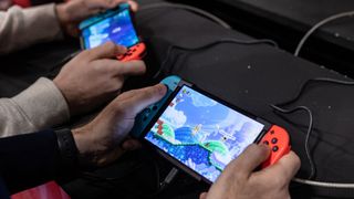 Two gamers playing with new Nintendo Switch 2 consoles