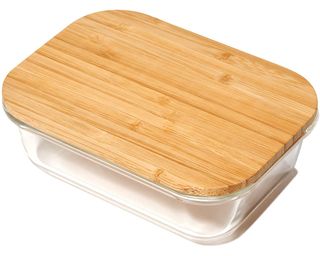 A glass food storage container with bamboo lid