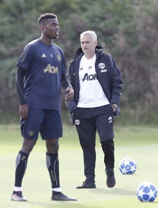 Mourinho (right) had a fractious relationship with Paul Pogba (left)