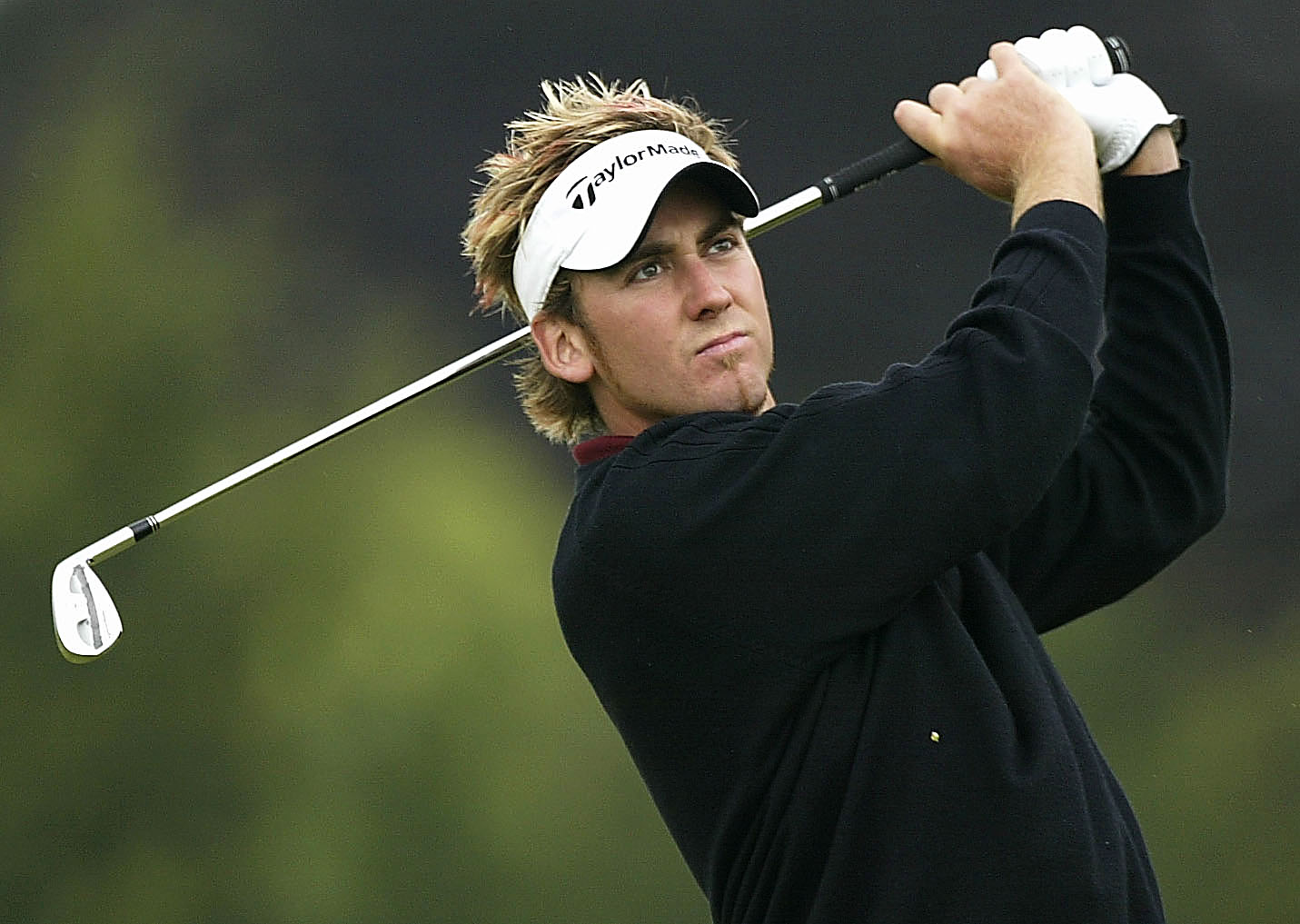 Ian Poulter's famous hair and visor combo