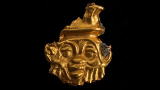 This gold amulet was found in the burial ground and depicts Bes, an Egyptian god associated with childbirth and fertility. The ancient Egyptians sometimes used images of this god to protect women giving birth and young children.