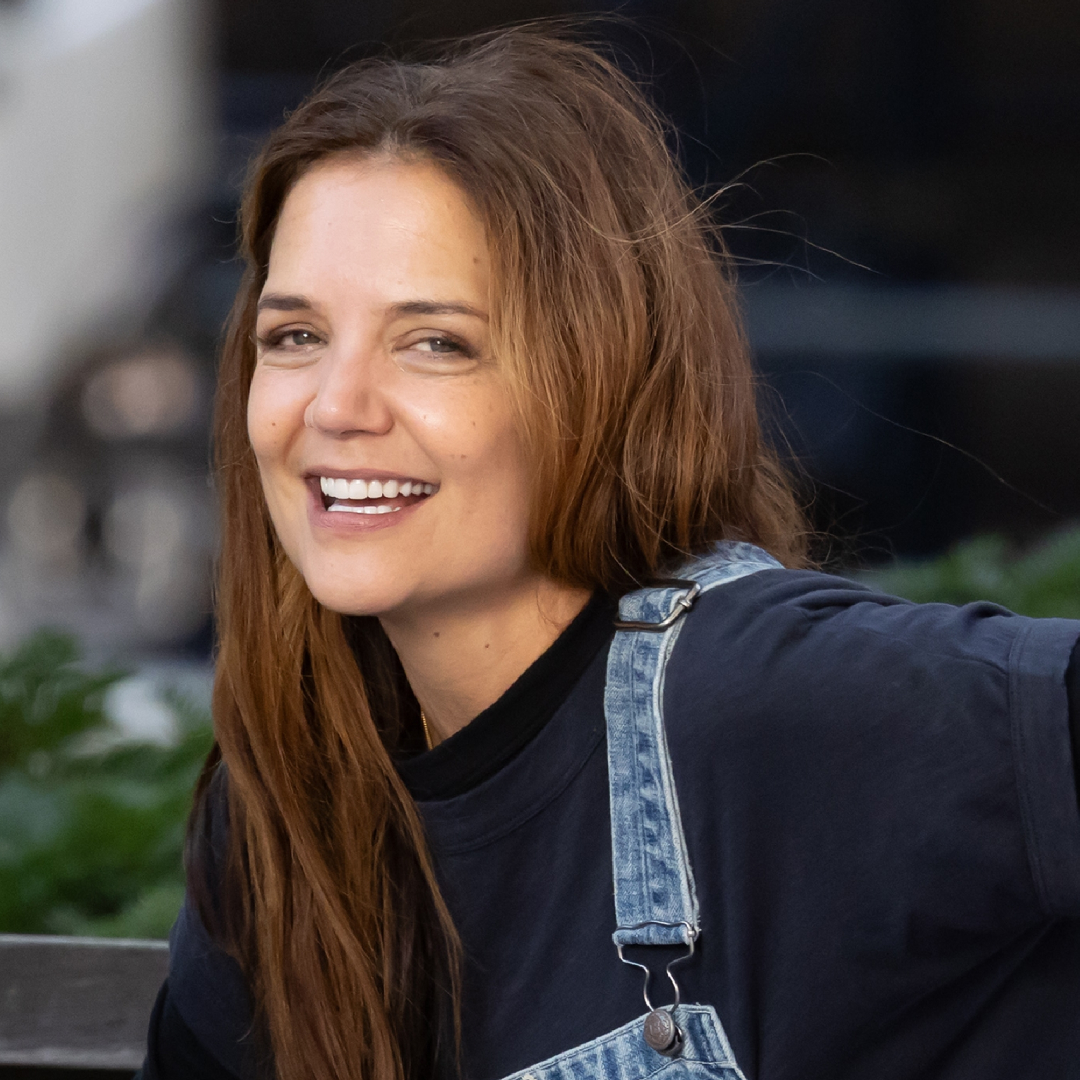 Katie Holmes styled denim overalls and cowboy boots on the set of 'Happy Hours'