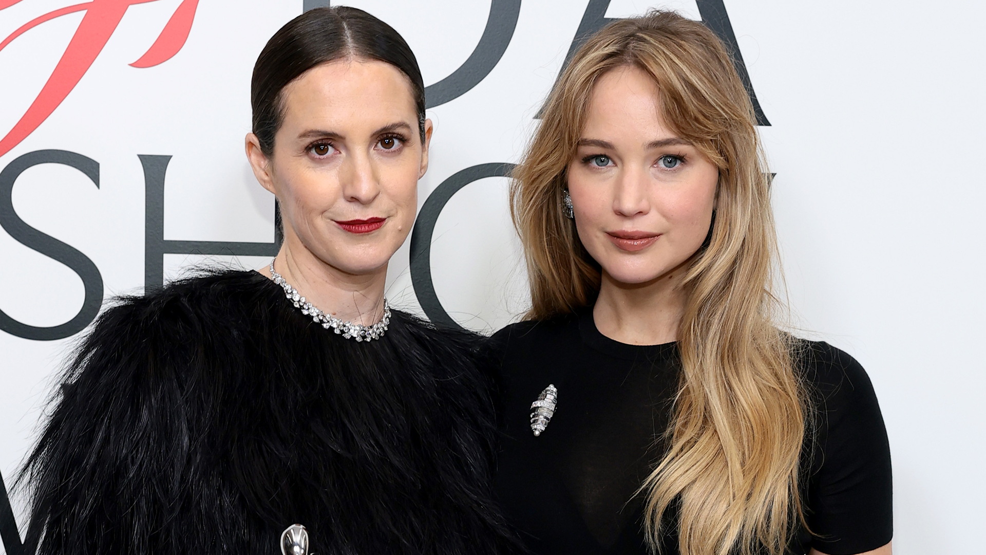 Jennifer Lawrence attended the CFDA awards wearing a black t-shirt dress and a silver brooch