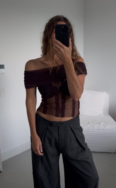 Angie wears a bustier top from H&M.