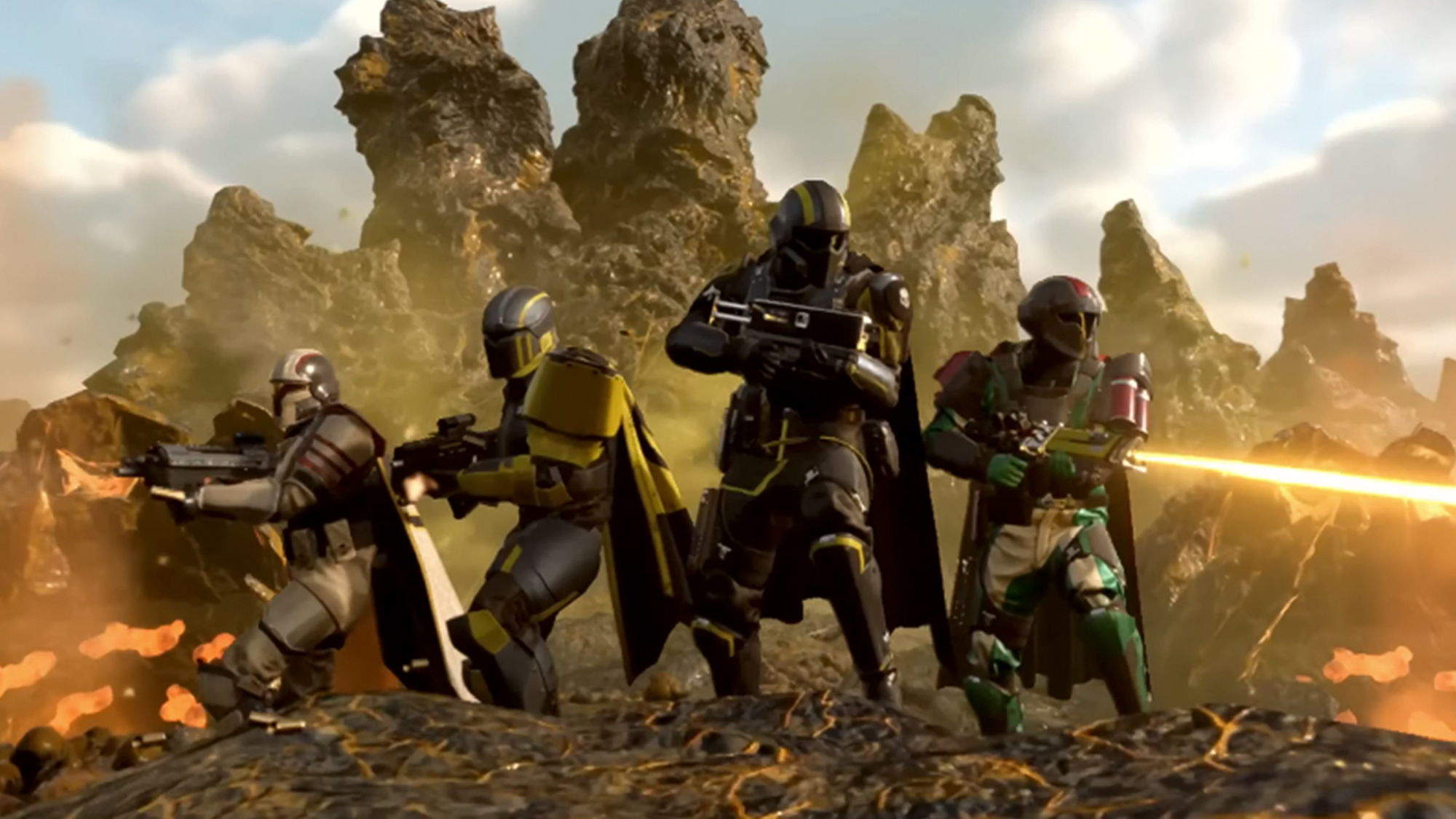 Four characters in Helldivers pointing their guns.