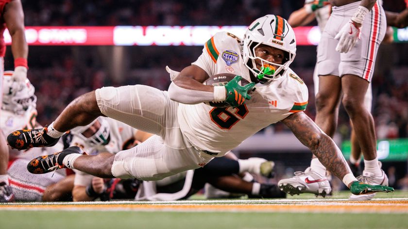 CharMar Brown of the Miami Hurricanes dives into the end zone for a touchdown during the College Football Playoffs.