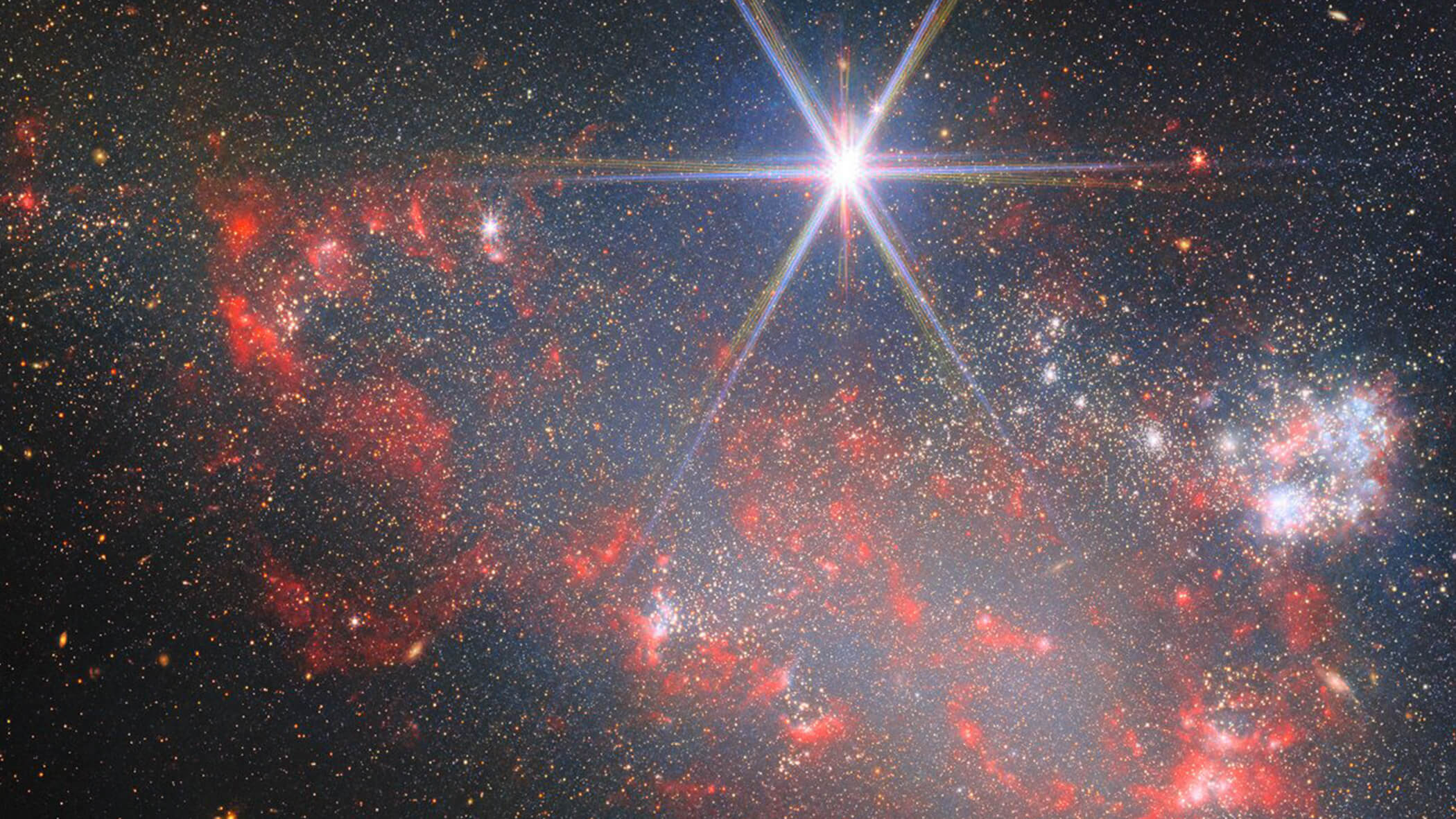 Galaxy wit bright star appearing in the foreground. 