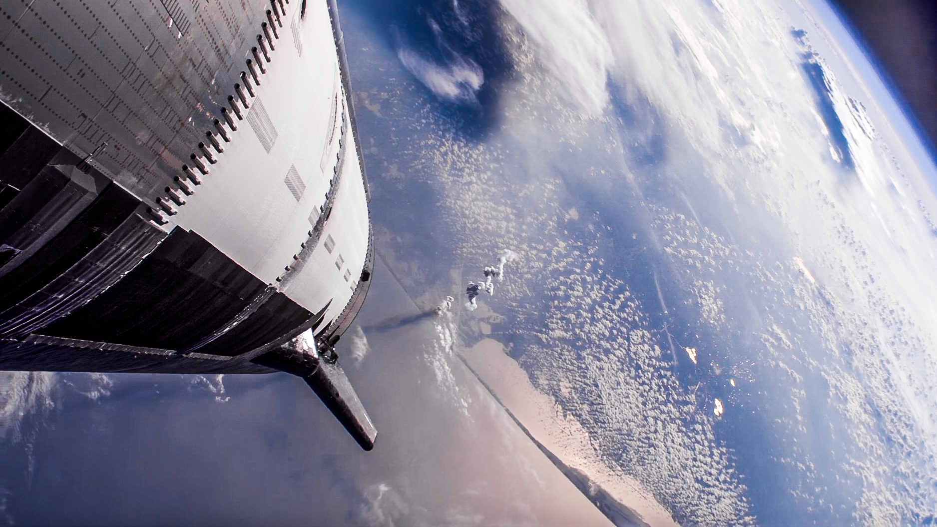 SpaceX&#039;s Starship megarocket soars above Earth on its ninth test flight, on May 27, 2025.