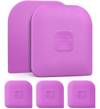 five square pink plastic scrapers with rounded edges 