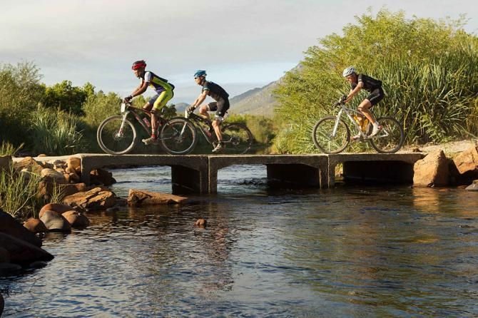 Riders cross the Olifants River