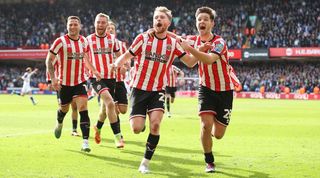Tommy Doyle celebrates his late winner for Sheffield United against Blackburn in the FA Cup quarter-finals in March 2023.