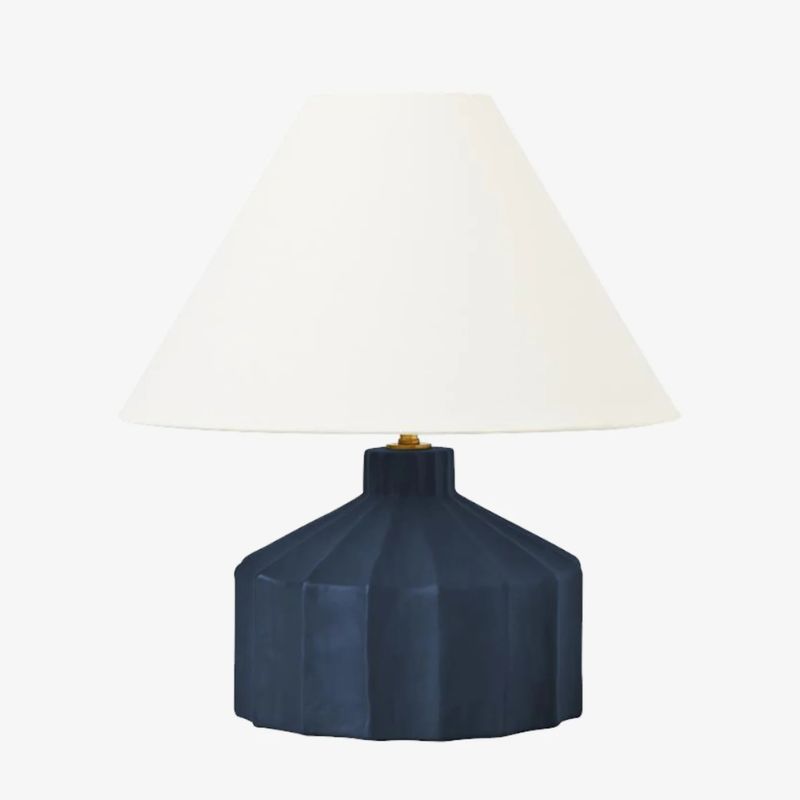 dark blue table lamp with white shade