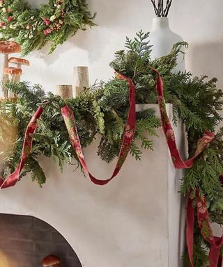 Fresh Juniper + Noble Fir Garland on a mantel.