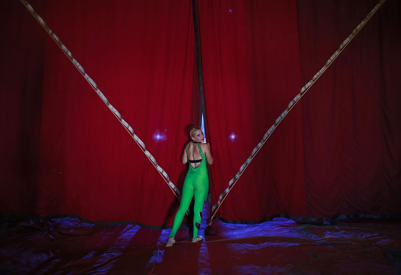 A Rambo Circus acrobat prepares for her entrance.