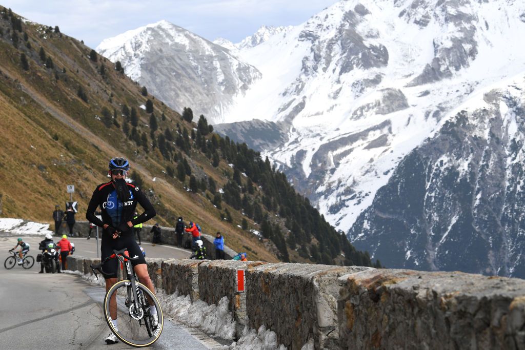 LAGHI DI CANCANO ITALY OCTOBER 22 Ben Oconnor of Australia and NTT Pro Cycling Team Passo dello Stelvio Stilfserjoch 2758m Landscape Mountains Snow during the 103rd Giro dItalia 2020 Stage 18 a 207km stage from Pinzolo to Laghi di Cancano Parco Nazionale dello Stelvio 1945m girodiitalia Giro on October 22 2020 in Laghi di Cancano Italy Photo by Tim de WaeleGetty Images