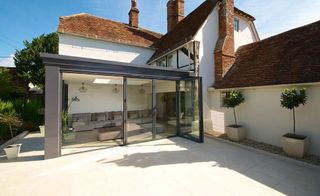 glass-extension-to-traditrional-home