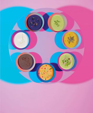 Bowls of different soups in a circle