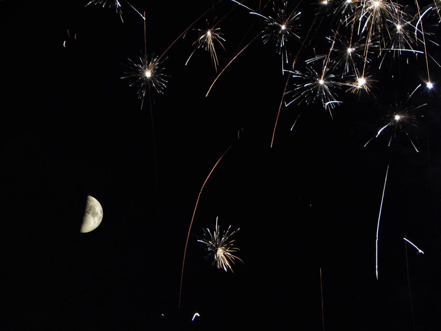 Fireworks and the Moon Dazzle in Spectacular Photo Space