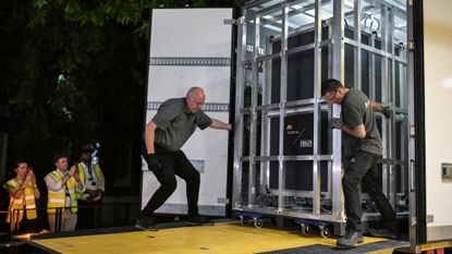 Workers unload a specially designed crate carrying the Bayeux Tapestry at the British Museum in London.