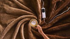Dreamland Caf&eacute; Collection Electric Blankets swirled together with a coffee cup in the middle