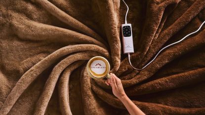 Dreamland Café Collection Electric Blankets swirled together with a coffee cup in the middle