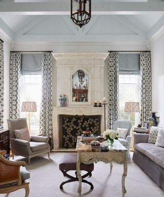 Gray living room with long patterned curtains