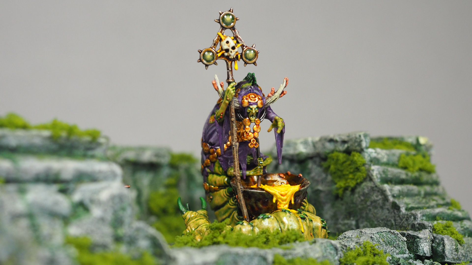 Warhammer Quest: Darkwater Cystwitch miniature in the middle of an overgrown, ruined structure