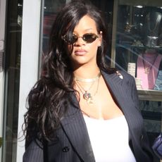 Rihanna wore cargo pants with pink Puma sneakers and a Gucci bag in L.A.