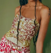 MIAOU X Urban Outfitters UO Exclusive Green Mesh Perri Corset, £48 $69 | Urban Outfitters