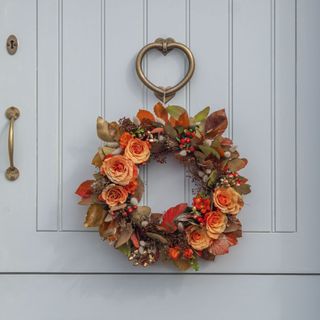 Autumn wreath hanging on door
