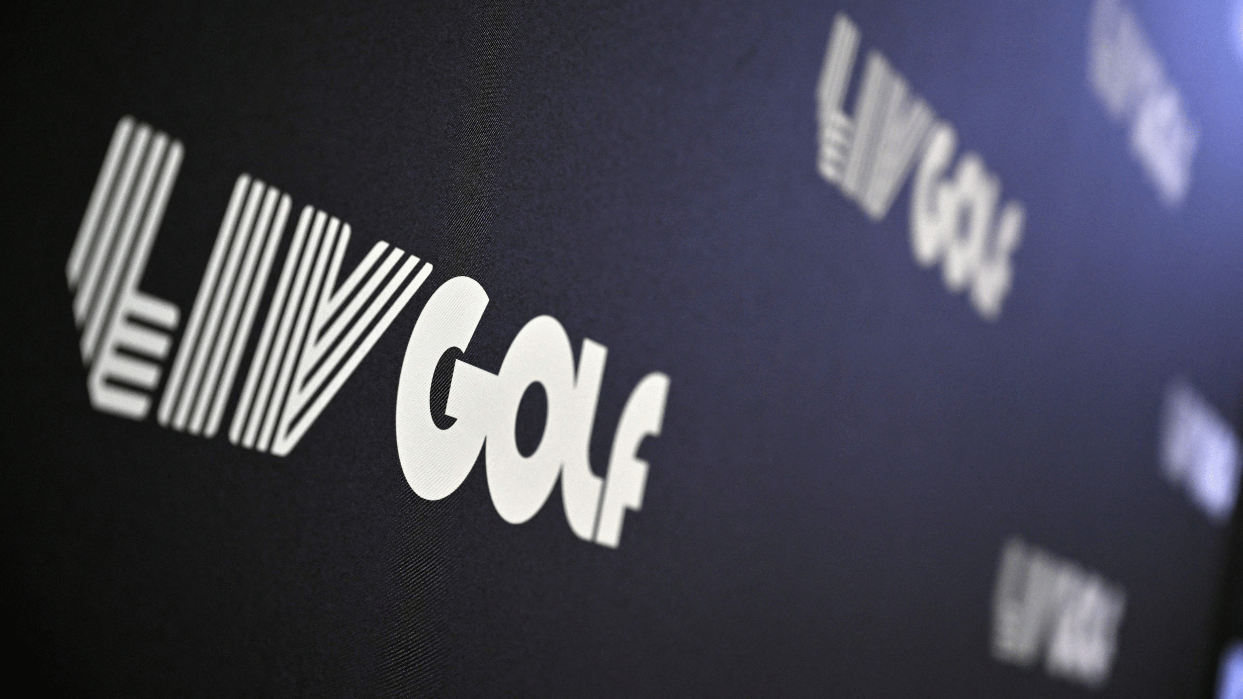 A general image of a LIV Golf logo on a black sign