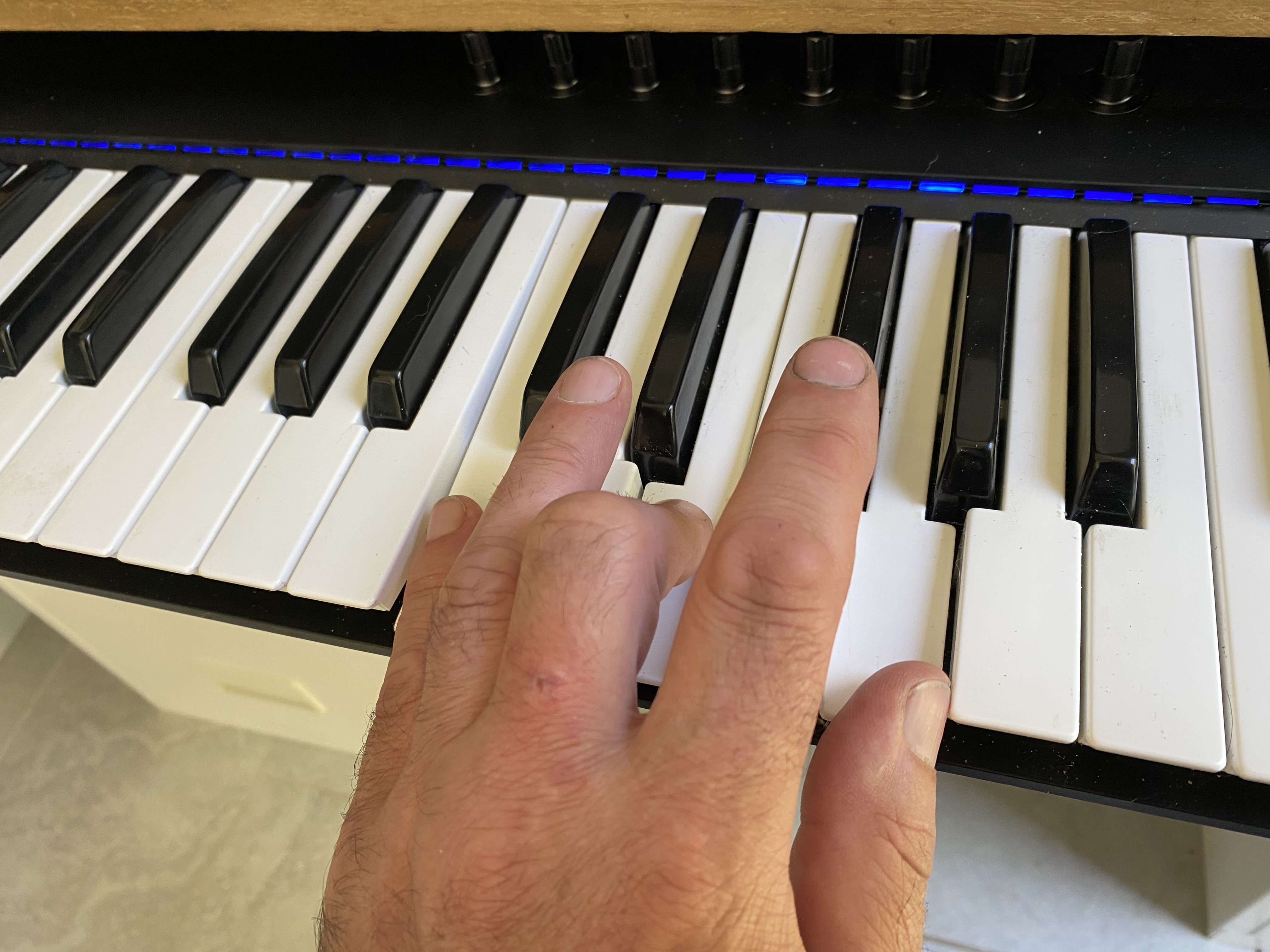 Left hand piano chord triad