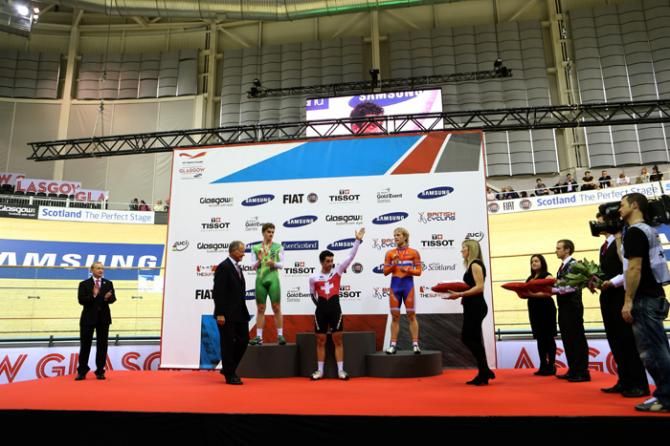 Tristan Marguet (Sui) takes the applause for winning the men's scratch race