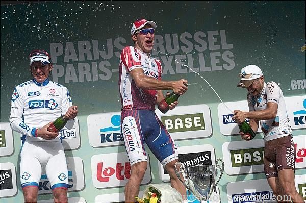 Champagne jets on the podium at Paris-Bruxelles