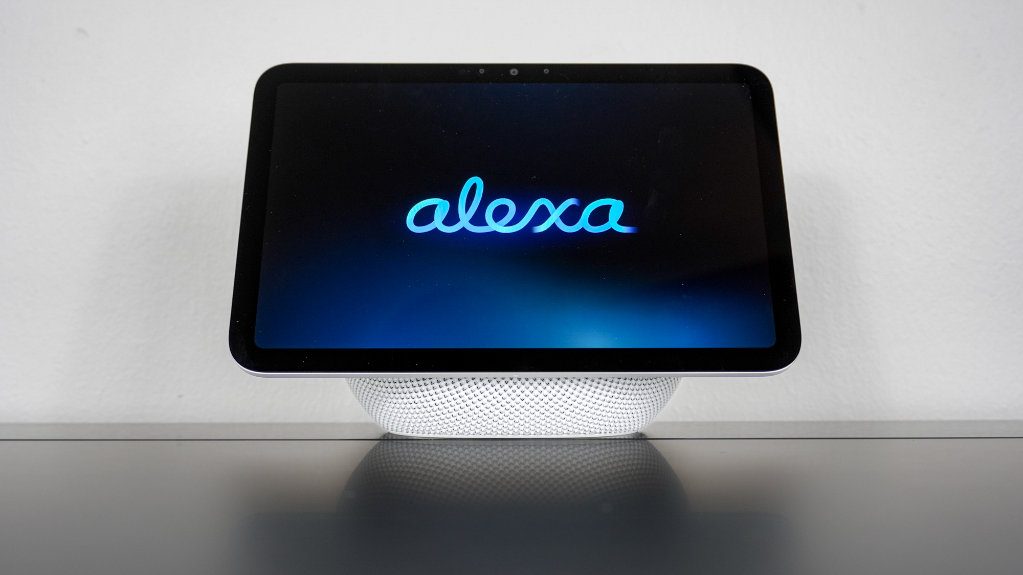The Echo Show 8 (4th Gen) with the Alexa+ logo on screen on a desk