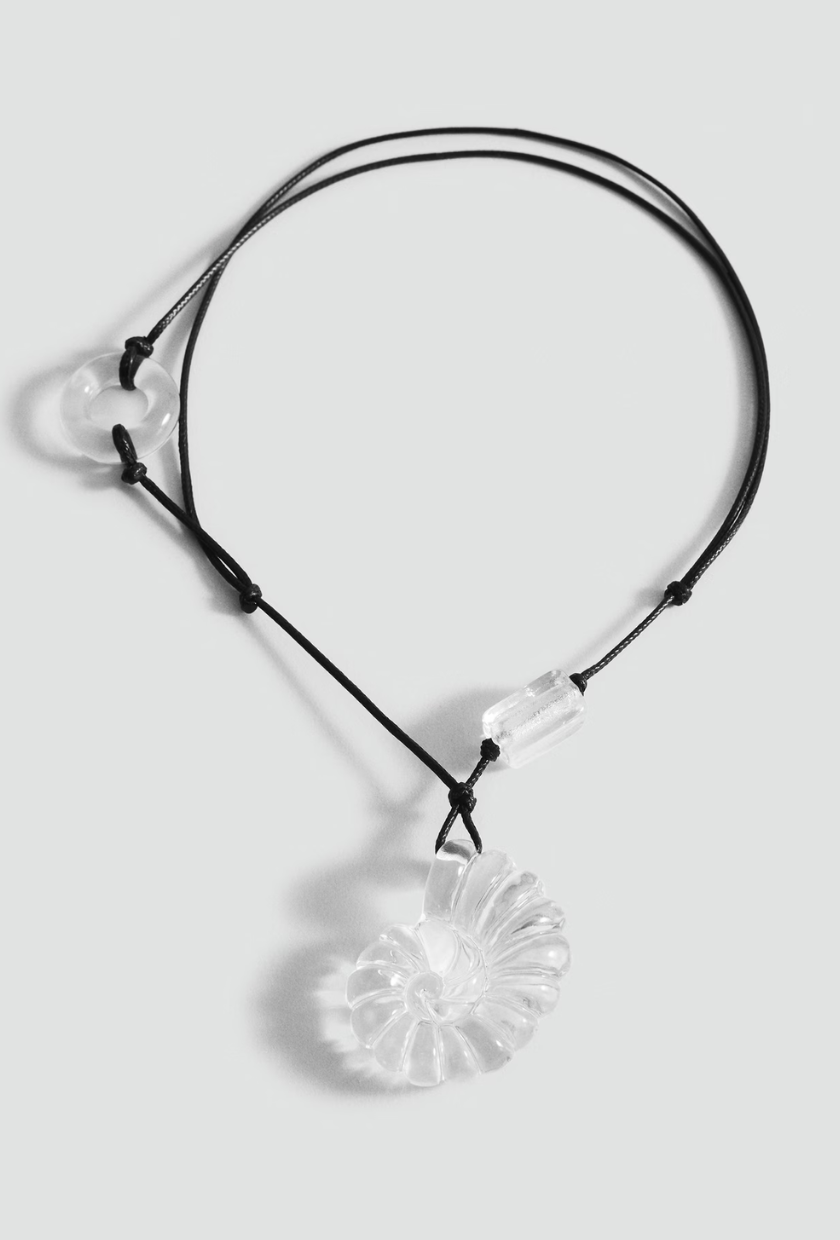 An image of a statement shell necklace from Mango.