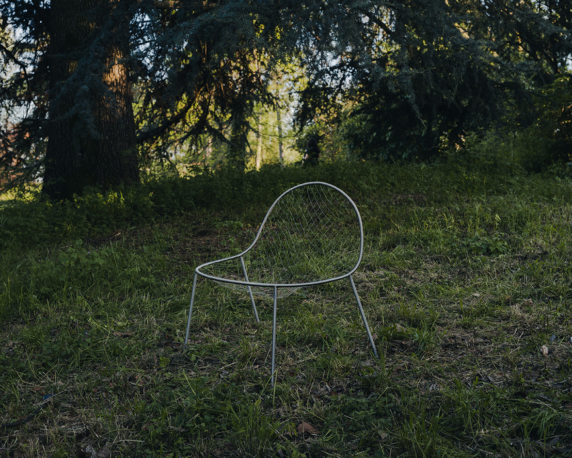 chair sitting in greenery as part of Junya Ishigami furniture to show at Maniera in Belgium
