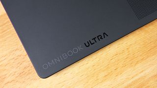 Close-up of the "OMNIBOOK ULTRA" text stamped on the palm rest of the HP OmniBook Ultra 16 RTX Spark