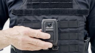 Motorola V700 body cam worn on the chest of a security officer close up