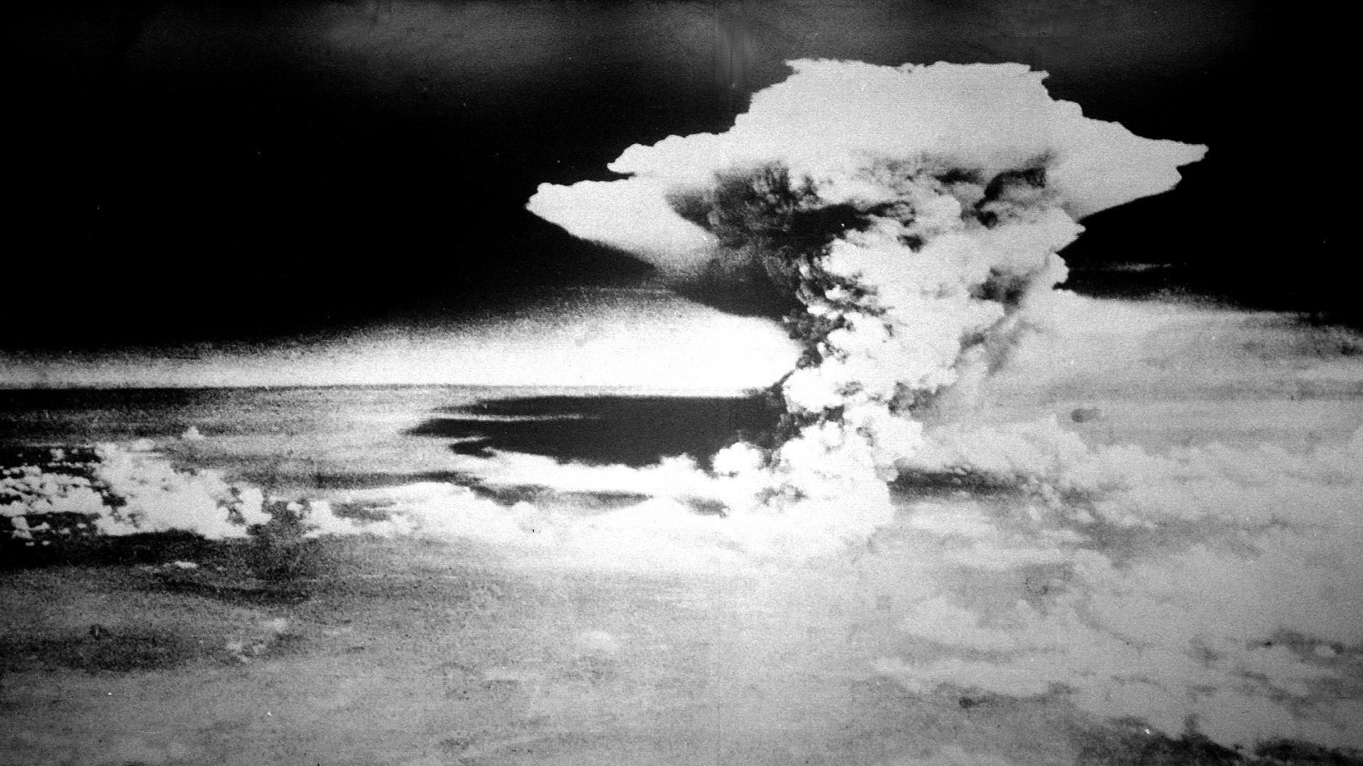 The mushroom cloud over Hiroshima following the detonation of the atomic bomb.