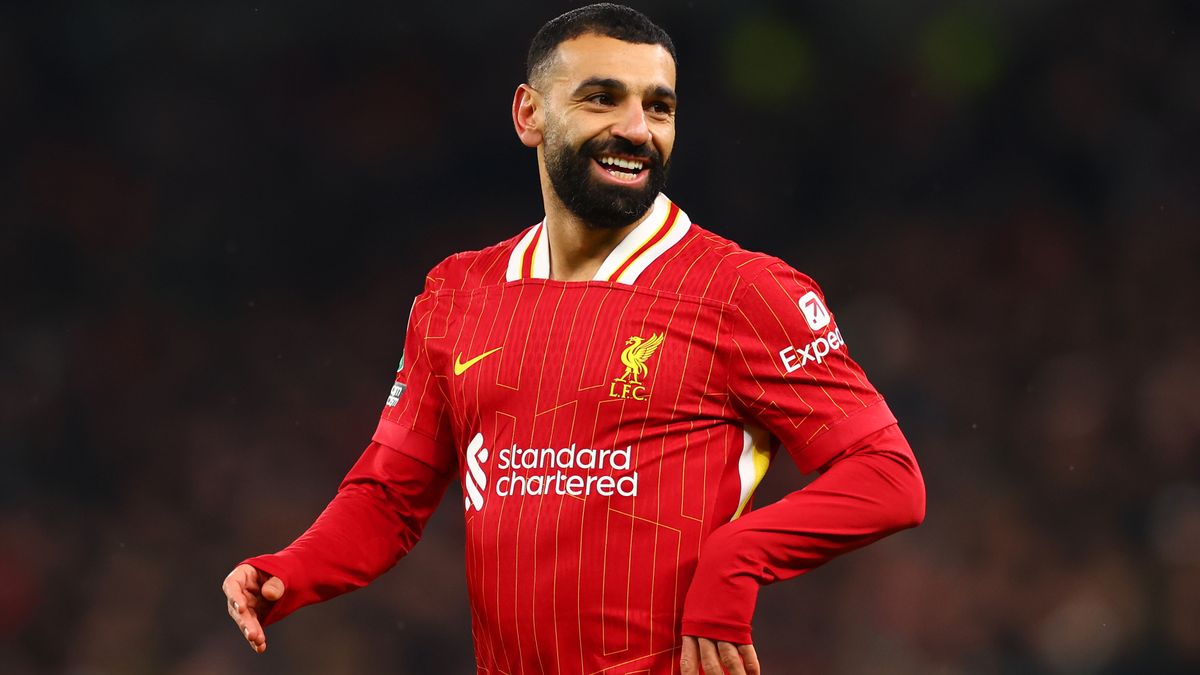 Mo Salah of Liverpool smiles during a match