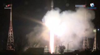An Arianespace Soyuz rocket launches from Baikonur Cosmodrome on March 21, 2020, carrying 34 internet satellites for the company OneWeb.