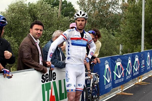David Millar waits for the team car after breaking