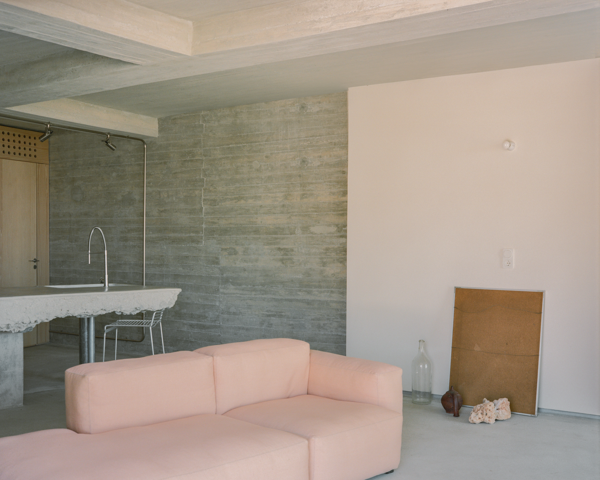 view of a Tinos house, using local vernacular such as stone walls and contemporary design
