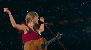 Taylor Swift during acoustic set of Eras Tour movie