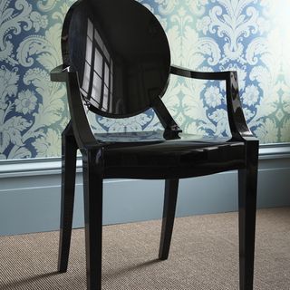 louis ghost chair withblue painted wall and flooring