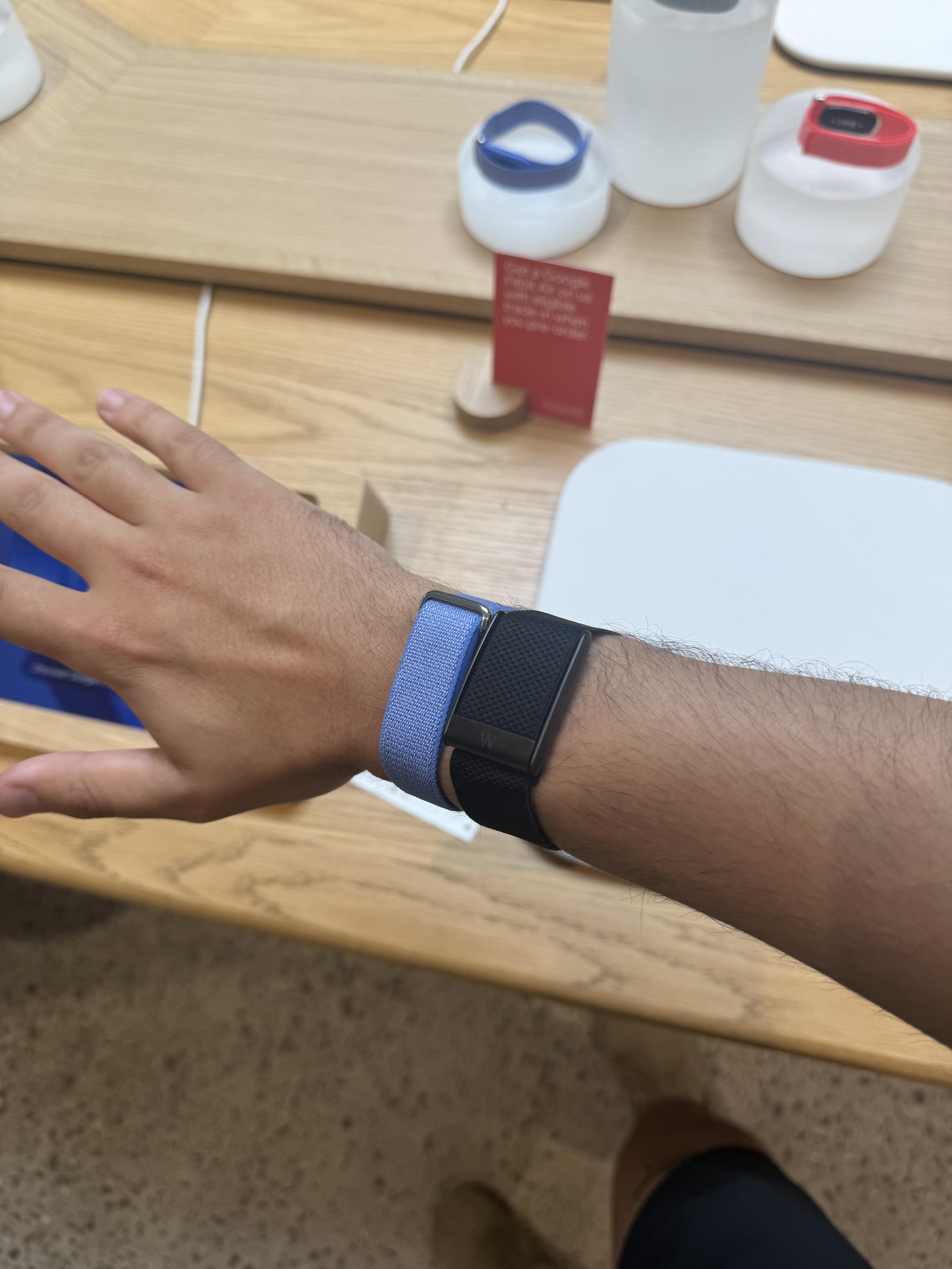 Fitbit Air next to a Whoop band