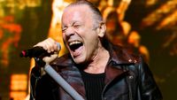 Bruce Dickinson performing onstage with Iron Maiden in 2025